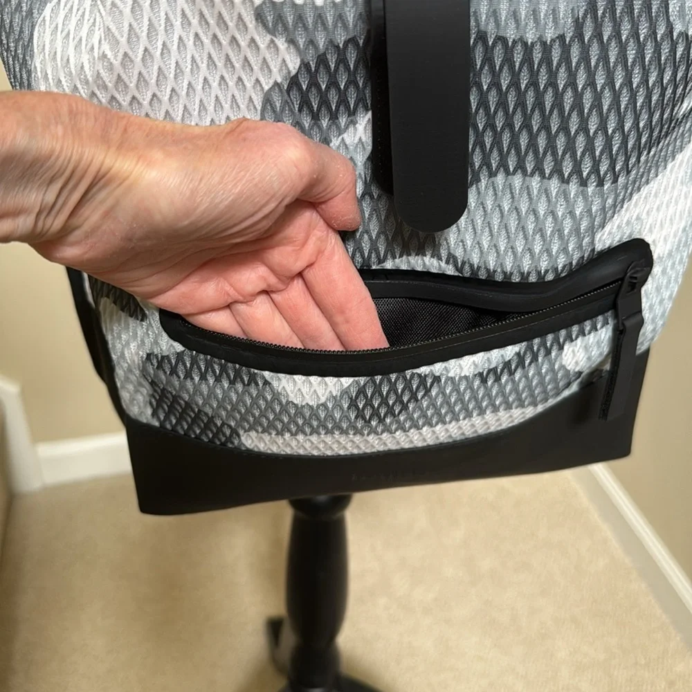 New Rains Black and Gray Unisex camo look Backpack.